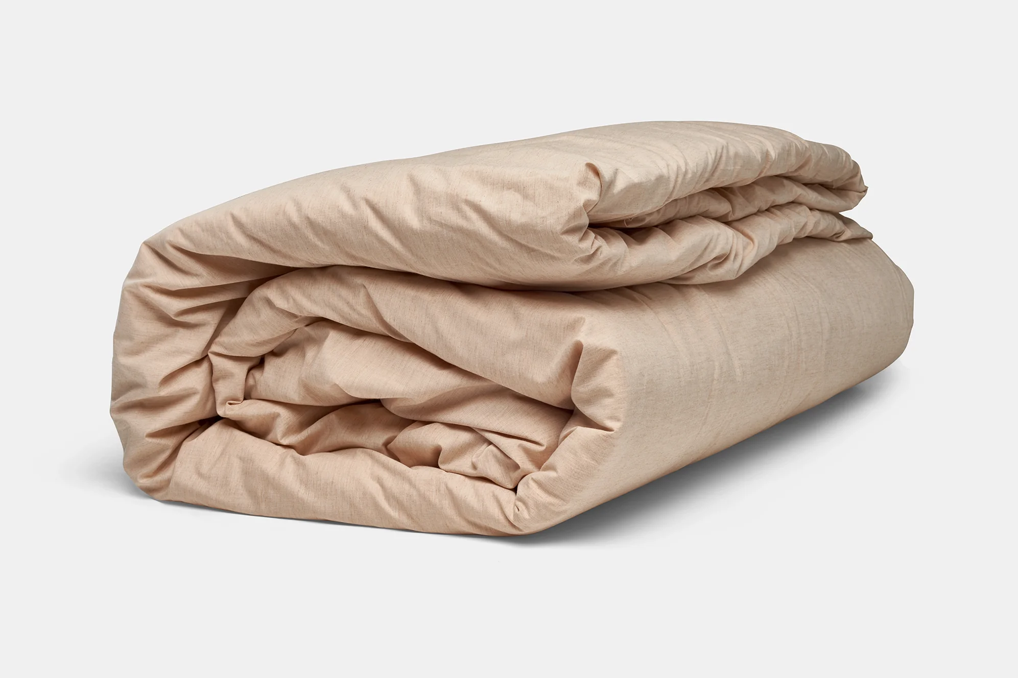 folded natural duvet cover shown with comforter insert