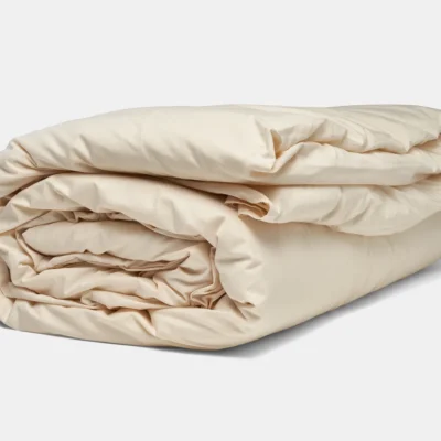 folded natural duvet cover shown with comforter insert